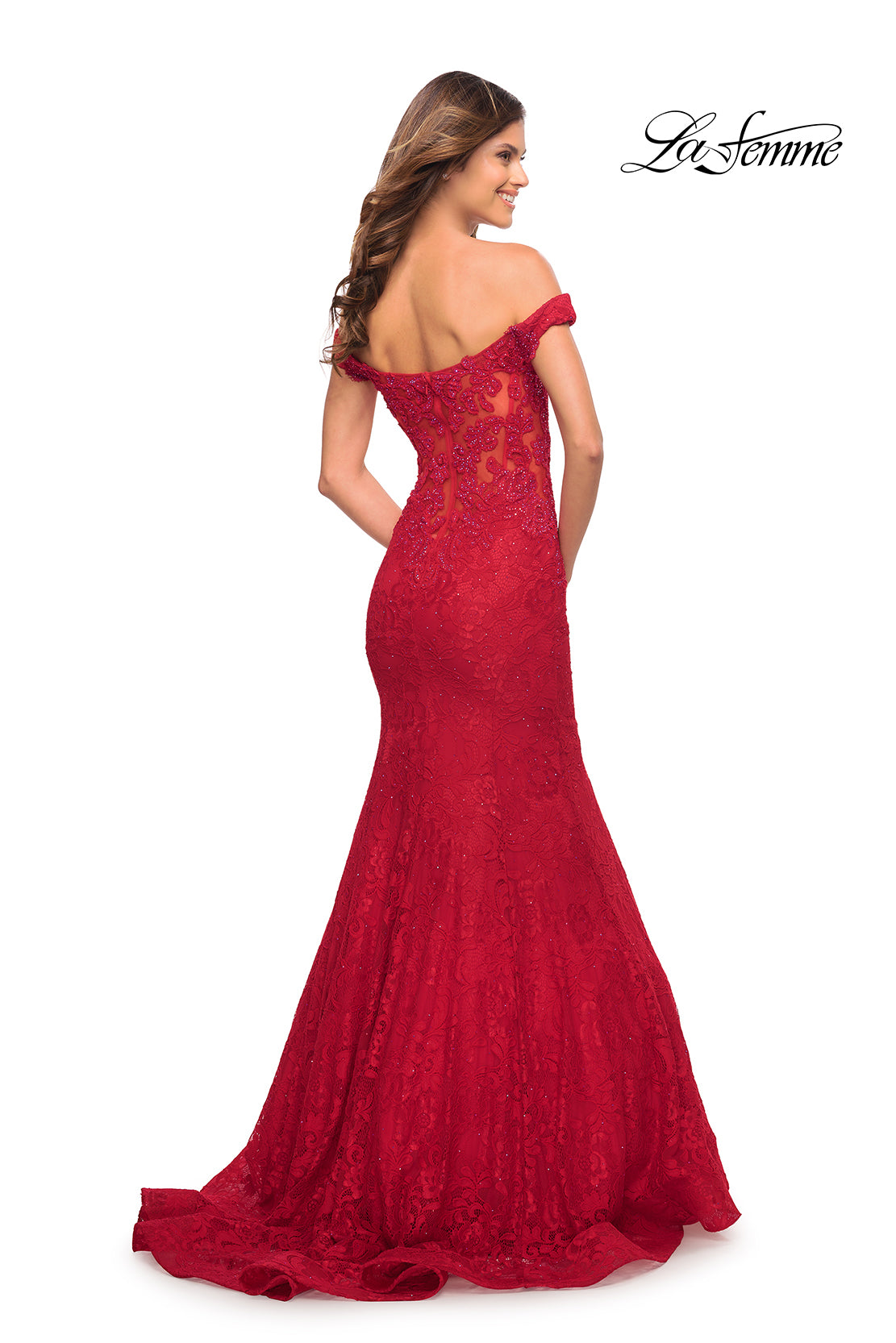 Woman poses with her back to the camera in a floor-length, off-the-shoulder red lace La Femme Off-the-Shoulder Long Lace Prom Dress featuring a fitted bodice and flared skirt.
